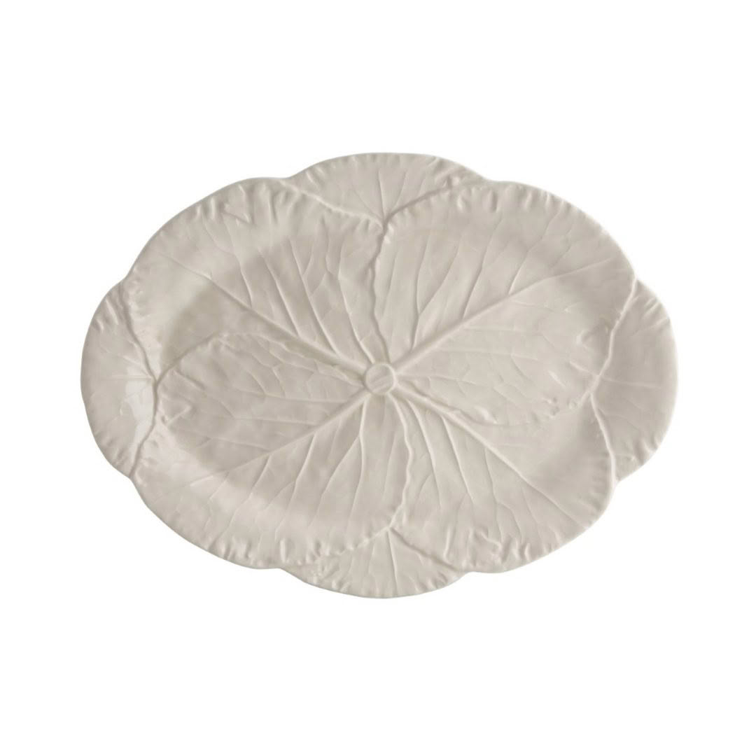 White ceramic leaf-shaped decorative plate