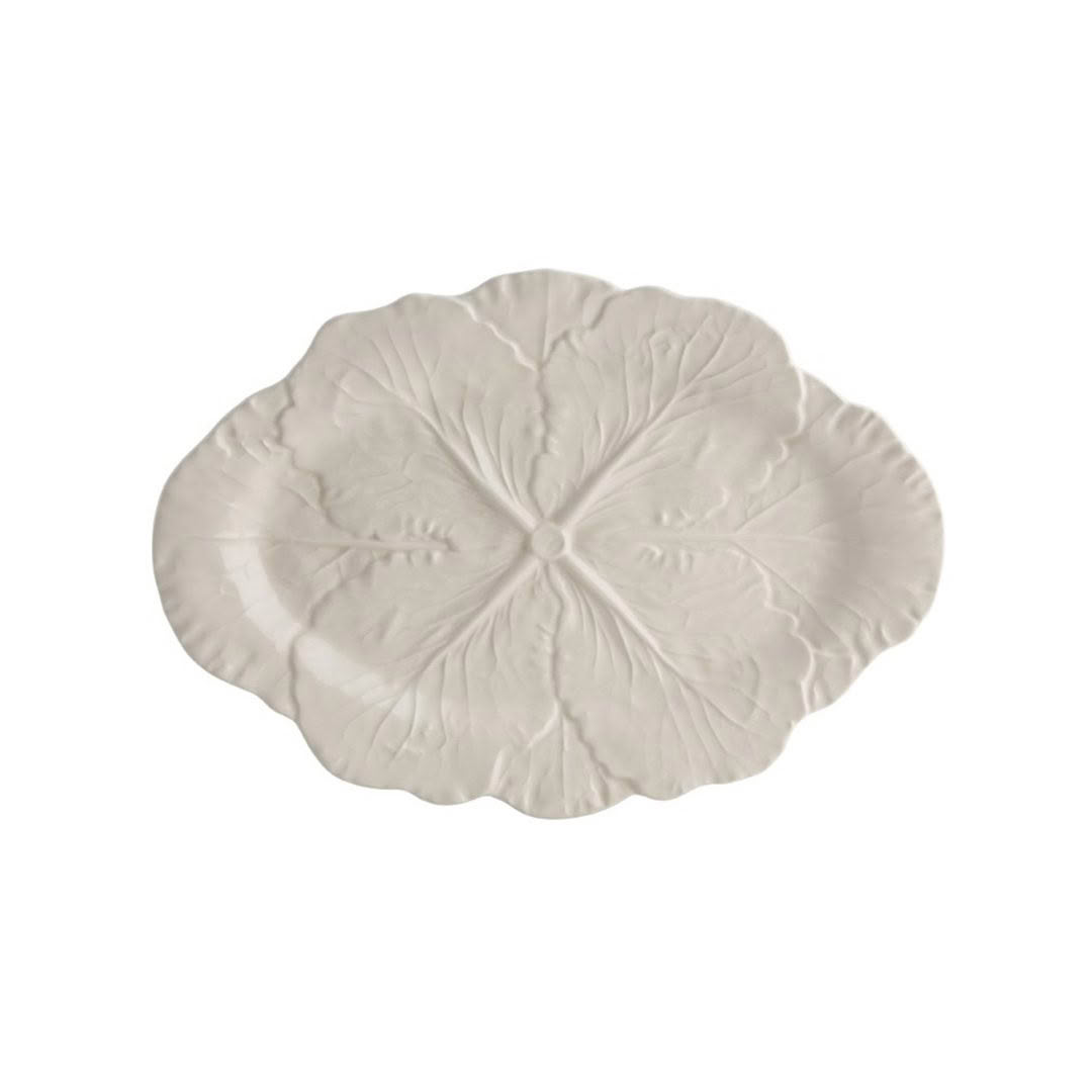 White ceramic leaf-shaped decorative plate