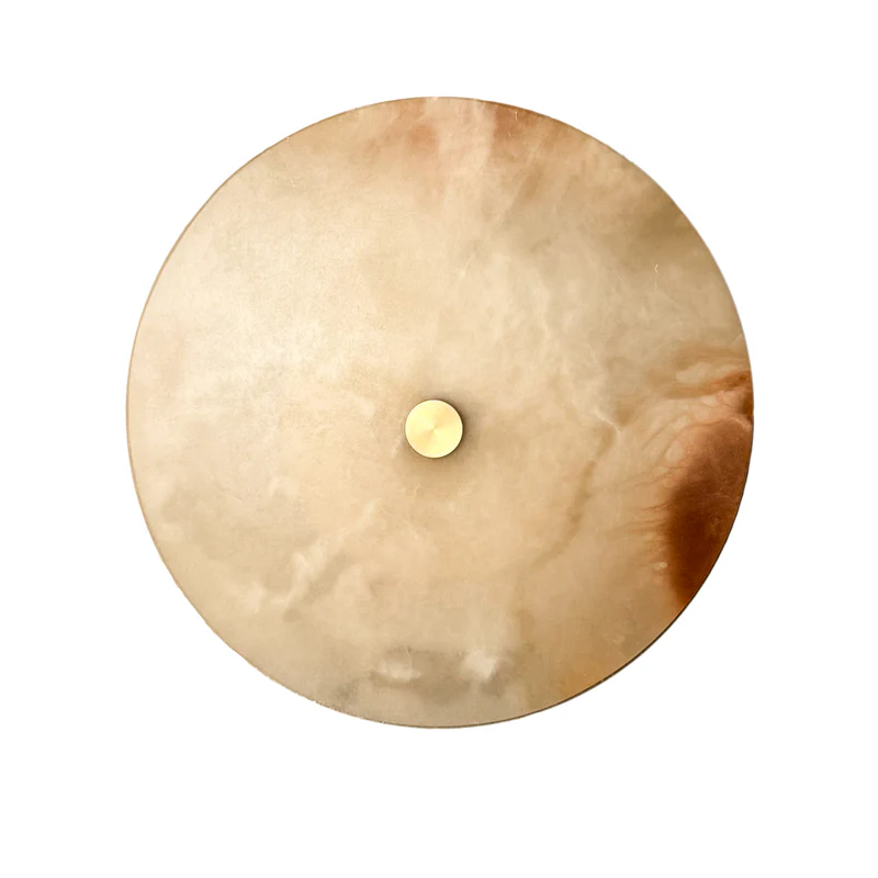 Close-up of textured golden percussion cymbal