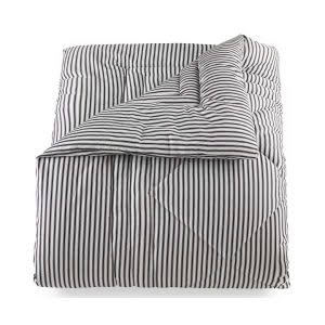 Black and white striped bedding set folded neatly