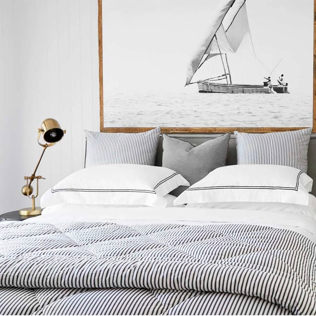 Ticking-Stripe-Comforter---Grey Minimalist bedroom with nautical theme and sailboat picture